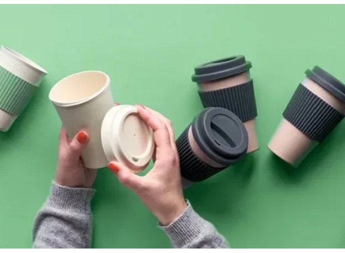 Pappedeckel Innovations a cardboard lid on a coffee cup]