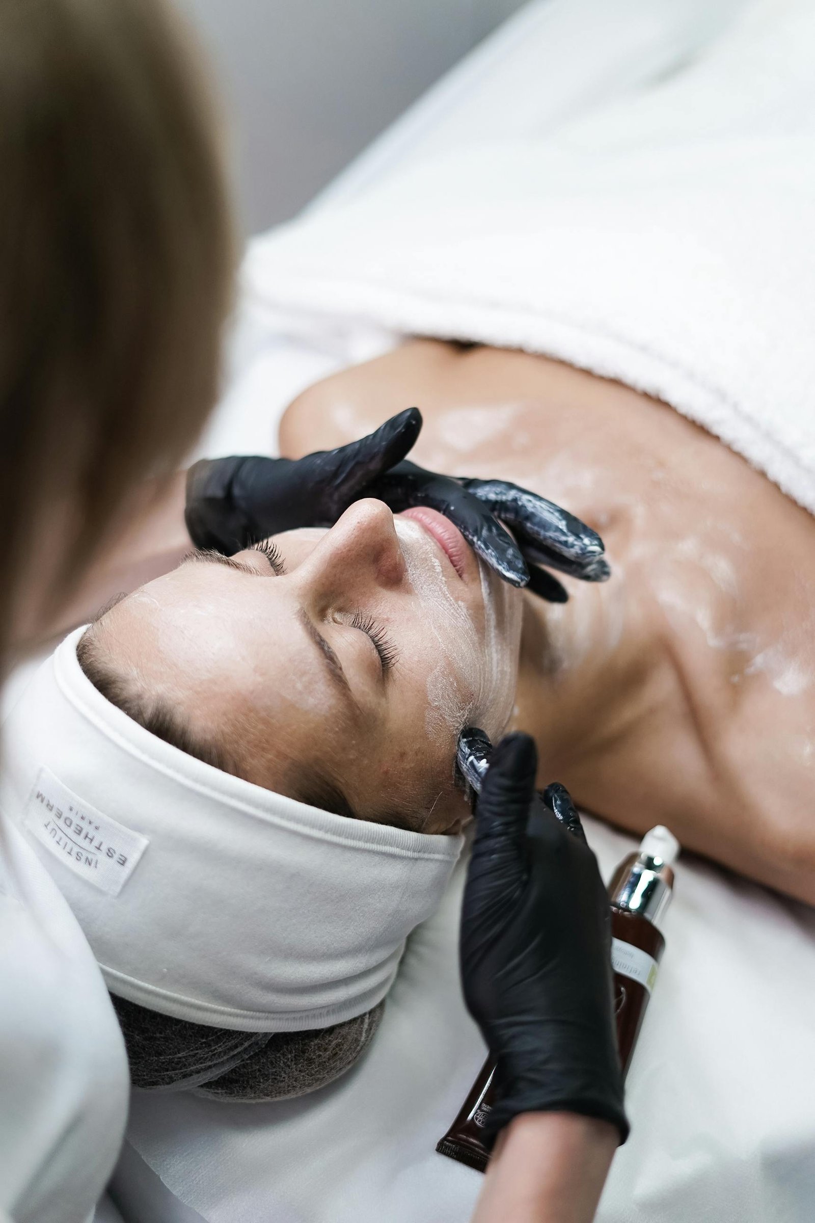 A Beauty Tips – Well Health Organic.com Skin Care in Hindi Wellhealthorganic relaxing skincare session with a woman receiving a facial treatment at a spa.